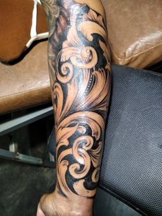 a person with a tattoo on their arm