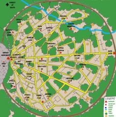 a map showing the location of some buildings and streets in an area that is green with yellow lines