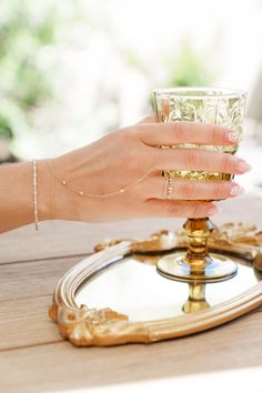 Add a dainty and delicate sparkly layer to your everyday stack with this diamond hand bracelet. A chain ring connects 3 diamonds by the yard chain to another diamonds by the yard bracelet. Looks so good when you’re holding an aperol spritz! 14k yellow gold .11 white round diamond carat weight 6 inch bracelet chain plus 1 inch extender allowing for 7 inches of bracelet Chain Length from ring to bracelet is 4 inches Made to order Dainty Diamond Bracelet For Party, Diamond Hand Bracelet, Diamonds By The Yard, Types Of Diamonds, Hand Bracelet, Bracelet Chain, Aperol Spritz, Diamond Carat, Diamond Cluster Ring