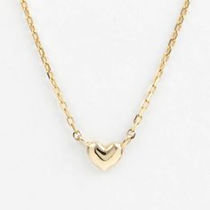 "Sweet and tiny heart necklace made of 14k solid gold available in yellow gold, white gold, and rose gold. The chain is faceted and shimmers as you wear. Lightweight yet a very sturdy piece. Add this simple necklace to your outfit for an effortless look. Perfect gift idea as it is a very subtle and adorable design. Purchase this sophisticated necklace for special occasions such as birthdays, anniversaries, Mother's Day, Valentine's Day, or even for bridesmaids! * Heart width x height: ≈5mm x ≈4m Small Heart Necklace, Tiny Heart Necklace, 14k Yellow Gold Necklace, Necklace Cute, Heart Necklace Diamond, Gold Heart Necklace, Tiny Diamond, Gold Gift, Cute Heart