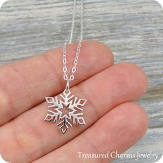 This Snowflake Necklace comes on a sterling silver chain that is available in different lengths. Please choose your desired length from the drop-down menu when placing the item in your shopping cart. { CHARM DETAILS }★ Material: .925 Sterling Silver★ Finish Color: Silver★ Measurements: 1/2" x 5/8"★ Dimensions: Double-sided{ SIMILAR ITEMS } More Christmas themed items available from my shop: https://www.etsy.com/shop/treasuredcharms/search?search_query=christmas{ GIFT OPTIONS}Gift boxes are avail Sterling Silver Snowflake Jewelry For Winter, Silver Snowflake Necklace For Holiday, Silver Snowflake Jewelry For Holidays, Holiday Silver Snowflake Jewelry, Sterling Silver Snowflake Jewelry, Holiday White Sterling Silver Necklace, Silver Snowflake Necklace For Gift, Silver Snowflake Jewelry For Christmas, Sterling Silver Necklace For Winter