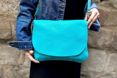 "► Our FREE delivery is TRACKED, secure and super FAST! This small or medium turquoise (teal) leather crossbody purse is handmade with soft and smooth quality Italian leather and has a zipper and flap. It's plain and simple but roomy enough to keep all your essentials. The bag is lined with 100%, light color cotton. We made this leather handbag lightweight and comfortable to carry in any occasion and style. It's small and slim, but big enough to fit all the essentials. It's also very versatile, Handmade Turquoise Shoulder Bag For Everyday, Turquoise Satchel Shoulder Bag For Everyday, Everyday Turquoise Shoulder Bag With Adjustable Strap, Turquoise Leather Everyday Shoulder Bag, Turquoise Crossbody Bag For Daily Use, Turquoise Leather Shoulder Bag, Teal Purses And Handbags, Turquoise Rectangular Everyday Bag, Turquoise Crossbody Shoulder Bag With Removable Pouch