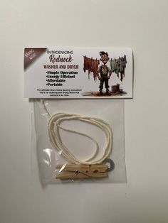 a white cord that has been wrapped in plastic and is on top of a package