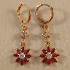 Beautiful Women's Classic Design Star Flower Sunflower Red Zircon Dangle Party Earrings 18k Yellow Gold Filled W/ Sparkling Ruby Red Marquise + Clear White Round Simulated Diamond Topaz Zircon Gemstones. Top Quality, High Polished Shine, Brand New, Never Been Worn. Lead, Nickel Free. These Gorgeous Earrings Sparkle. Perfect Jewelry For Any Special Occasion Gift Anniversary Wedding Banquet Dating Birthday Engagement Dance Holiday Party Christmas Stocking For Yourself Mom Women Or Friend. Free $18 Engagement Dance, Earthy Earrings, Flower Sunflower, Earrings Sparkle, Stone Dangle Earrings, Wedding Banquet, Sterling Silver Wire Wrap, Red Diamond, Sparkle Earrings