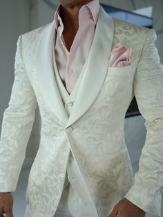 Happy Sunday 🤩🥂 Check out the amazing details of our latest White Paisley Dinner Jacket Look! Paired it with Pink today 💖🤍 Tag someone who needs this in their life 🙏🏻 #sebastiancruzcouture #whitepaisley #jacquardsuit #smokingjacket #bespoke #groom #groomstyle #mensclothing #mensfashion #dinnerjacket Tailored Outerwear With Buttons For Wedding, Elegant Outerwear With Shawl Collar And Button Closure, Wedding Outerwear With Double Button Closure And Long Sleeve, Designer Fitted Blazer With Shawl Collar, Long Sleeve Outerwear With Double Button Closure For Wedding, Tailored Wedding Blazer With Covered Buttons, Wedding Outerwear With Lapel Collar And Double Button, Tailored Cream Outerwear For Wedding, Elegant Cream Outerwear With Shawl Collar