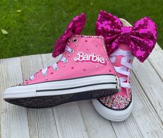 Pink Barbie Blinged Converse Sneakers, Infants and Toddler Sneakers These authentic Pink Converse have high quality glass crystals, Converse emblem and back of the shoe. They are accessorized with a pink sequin bow. Information about the shoes All sneakers are Converse brand and have a mix of hand applied high quality glass crystals and resin flat-backs. Please select your color choice by the available drop down options, an option of all glass crystals no color is also available. Converse sizing Ladybug Tutu, Bling Converse, 1st Birthday Tutu, Birthday Party Dresses, Handmade Tutu, Dresses Pageant, Pink Converse, Toddler Sneakers, Pink Barbie