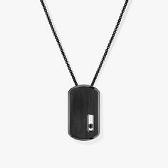 It didn't take long for the Move Titanium jewelry collection to become a must-have in men's wardrobes. This time, Valérie Messika has created a military-inspired necklace that completes the collection and adds a rock feel. Made from black titanium with a brushed metal finish, this luxury necklace is enhanced by a moving black diamond inspired by the iconic Messika Move motif. Black Diamond Necklace, Titanium Jewelry, Inspired Necklace, Luxury Necklace, Necklace For Men, Military Inspired, Brushed Metal, Diamond Pendant Necklace, Men Necklace