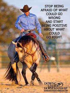 a man riding on the back of a brown and black horse in an arena with words above it