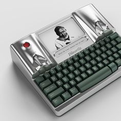 an old fashioned computer keyboard with a photo on it