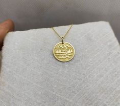 "Mountain Necklace - Engraved Wanderlust Charm - Gold Mountain Charm - Gold Mountain Pendant ▪️ A beautiful and clean engraved Mountain pendant made out of 14K Solid Real Gold. Available only in yellow gold! Dimensions - Small - 13x13mm / 0.51 x 0.51 inches Medium - 14x14mm / 0.55 x 0.55 inches Big - 15x15mm / 0.59 x 0.59 inches Necklace Length - You can choose your chain length from 35CM to 50CM. The pendant is available alone without a chain, select \"No Chain\" on the necklace length section. Cadmium-free 14k Gold Round Jewelry, Handmade Custom Necklace In Yellow Gold, 14k Yellow Gold Cadmium-free Necklace, Cadmium-free 14k Yellow Gold Necklace, 14k Gold Pendant Jewelry, Cadmium-free Yellow Gold Round Necklaces, Cadmium-free Yellow Gold Round Necklace, Mountain Pendant, Wanderlust Necklace