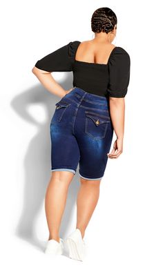 Keep up with the season's hottest new trends with the Killer Pins Short. Boasting a frayed hem with trendy faded detail and a high rise fit, this curve-embracing pair are a summer favorite. Key feature includes: - High rise - Double button and zip fastening - Belt looped waistline - Classic 5 pocket denim styling with flap back pockets - Dark denim wash - Knee length - Rolled cuff - Super stretch denim fabrication Match this short to a cropped denim jacket and a distressed tee! | Plus Size Plus Cropped Moto Jacket, Distressed Tee, Knee Length Shorts, Cropped Denim Jacket, Cuffed Shorts, Plus Size Shorts, Long Shorts, Cropped Denim, City Chic