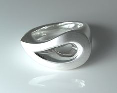 "This beautiful ring is handmade of 925 sterling silver, It's name is „Drop\". You will be amazed by its soft and elegant look at the same time as it is absolutely comfortable to wear.  The size of the matt polished drop is 1 x 0.6 inches. The total weight is appr. 19 grams (depending on the size you choose). The ring is made of 925 sterling silver, it can be goldplated with everlasting 18ct yellow gold as well as in a beautiful vermillion rosegold. If you decide to go for this ring you will gain a friend for a lifetime. For the individual manufacturing of your perfect size we will need appr. 4 weeks (unless we have your size in stock). For urgent orders please contact me, and I will see what we can do.  This special ring will be delivered in a nice little box and as my special gift I will Modern Silver Jewelry With Brushed Finish, Modern Silver Teardrop Ring, Modern Silver Rings With Brushed Finish, Contemporary Sterling Silver Rings For Gifts, Contemporary Sterling Silver Rings As Gift, Special Ring, Beautiful Ring, Color Ring, Silver Band