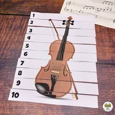 an image of a violin on top of sheet music