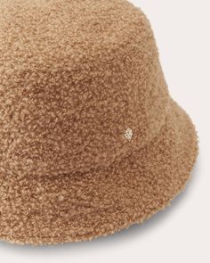 Helen Kaminski Mackenzie Bouclé Bucket Hat | OLIVELA Luxury Mini Hats With Short Brim For Spring, Luxury Short Brim Hat, Luxury Summer Mini Hats With Curved Brim, Luxury Brown Wide Brim Bucket Hat, Luxury Women's Curved Brim Bucket Hat, Luxury Beige Brimmed Bucket Hat, Luxury Winter Bucket Hat With Curved Brim, Luxury Short Brim Mini Hats For Spring, Luxury Mini Hats With Curved Brim For Summer