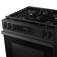 a black oven with the door open on an isolated white background for use in commercial projects