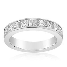 a white gold ring with princess cut diamonds