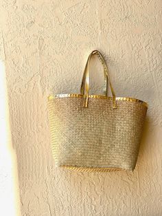 These funky boho chic raffia and gold trim totes are the perfect touch of shine to any outfit! Whether you're heading to the beach, park or on a city adventure, these totes are a great carry all to toss all your goodies in! Sizing: 17 inches wide x 14 inches deep x 9.5 . inches wide Gold Straws, Elephant Keychain, Plastic Gift Wrap, Raffia Hat, Different Hats, Shopper Bag, Gold Trim, Straw Bag, Purses And Handbags