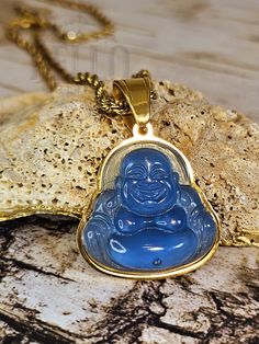 Embrace tranquility and joy with these beautiful blue Buddha pendant necklaces. Adorned with sparkling diamonds and set in a luxurious gold frame, these pendants are perfect for spiritual seekers and style enthusiasts alike. Each pendant symbolizes peace, wisdom, and good fortune, making them ideal for gifting or personal wear. Elevate your spiritual journey and fashion with these stunning pieces #BlueBuddhaPendant #PeacefulJewelry #SpiritualAccessories #GoldJewelry #ElegantNecklaces Adjustable Hypoallergenic Blue Necklaces, Adjustable Blue Hypoallergenic Necklace, Adjustable Hypoallergenic Blue Necklace, Blue Hypoallergenic Round Pendant Jewelry, Blue Teardrop Spiritual Jewelry, Blue Hypoallergenic Pendant Necklaces, Blue Hypoallergenic Pendant Necklace, Hypoallergenic Blue Pendant Necklace, Blue Pendant Jewelry For Meditation