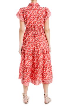 Vibrant florals bloom upon this shirtdress framed by a spread collar and flutter sleeves. 47 1/2" length Spread collar Short sleeves Unlined 100% polyester Machine wash, line dry Imported Model stats: 5'10" height, 32" bust, 25" waist, 36" hip. Model is wearing size Small. Red Relaxed Fit Dress For Spring, Casual Floral Dress With Ruffle Sleeves, Casual Floral Dress With Ruffle Hem And Flutter Sleeves, Bohemian Midi Dress With Ruffle Sleeves For Spring, Brunch Floral Dress With Flutter Sleeves, Flowy Ditsy Floral Print Dress With Ruffle Sleeves, Flowy Dress With Ditsy Floral Print And Ruffle Sleeves, Casual Floral Dress With Flutter Sleeves For Garden Party, Ditsy Floral Print Flutter Sleeve Dress For Brunch