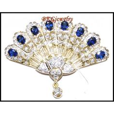 Our jewelry is entirely handmade in our Thailand studio. We focus on bringing creative and symbolic design to fine jewelry crafted in precious metal and set with superior quality gemstones and diamonds. For more Blue Sapphire Brooches, click here: https://www.etsy.com/shop/BKGjewels?section_id=18898744 Brooch/Pin information Metal: Yellow Gold 18 Karat Gold Weight: 14.90 grams Appraisal Value: $9050 Sapphire information: Shape or Cut: Oval Quantity: 8 Stones Total Weight: 3.49 carats (100% Genuine Natural) Clarity: Eye very clean Color: Blue Diamond information: Shape or Cut: Round Brilliant Quantity: 1  3 and 129 Stones Total Weight: 0.12  0.22 and 0.84 carats (100% Genuine Natural) Clarity: Eye clean SI1-2 Color: G-H Colorless FEATURES - This item can be made with a variety of gemstones Blue Diamond Brooches For Anniversary, Blue Diamond Gemstone Brooches, Fine Jewelry Diamond Gemstone Brooches, Diamond Gemstone Brooches In Art Deco Style, Art Deco Diamond Brooches With Gemstone, Elegant Sapphire Diamond Brooches, Elegant Sapphire Diamond Brooch, Blue Hallmarked Brooches For Anniversary, Formal Sapphire Diamond Brooches