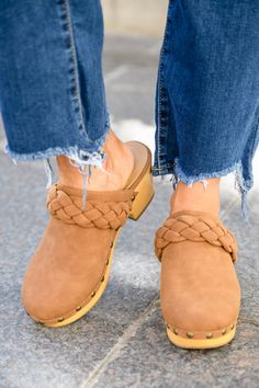 Take cute to a whole new level this season in the Taylor Braided Clogs In Brown! A smooth faux leather shapes a rounded toe with braided detail and wooden sole decorated in metal studs. Pair these cute clogs with all your fall fits for a complete look! True to size + Lightweight Faux leather + Matte Approx. 2 3/4" heel Keywords: Clog, Mule, Braided, Brown, Shoe