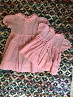 These are the cutest dresses! Two identical Polly Flinders pink Swiss dot party dresses- one in 3T and the other 6x. Peter Pan collar, short puff sleeves, and buttons up the back. Best when worn with a slip (not included). Fantastic condition. MEASUREMENTS (taken flat, double when appropriate) 3T PTP 12 Sth 15 1/2 6x PTP 14 Sth 23 This is the perfect unique gift for a loved one, or yourself! Please be sure to email all questions before purchasing, as I do not take returns. As always, I am here t Playful Ruffled Short Sleeve Dress, Playful Short Sleeve Dress With Ruffles, Pink Ruffled Dress With Short Sleeves, Pink Short Sleeve Dress With Ruffles, Sweet Fitted Dresses For Spring, Short Sleeve Ruffled Dress For Tea Party, Spring Daywear Swiss Dot Dresses, Playful Sleeveless Daywear Dresses, Spring Swiss Dot Dresses For Daywear