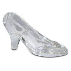 a clear high heeled shoe with a crystal heart on the toe and an embellishment