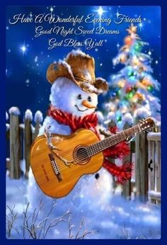 a snowman holding a guitar in front of a christmas tree