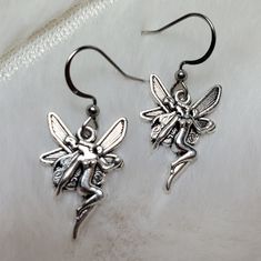 Small Fairy Charm Earrings. These Charms Are Approximately 27x16mm. Brand New And Made From Alloy Metals. #Fairy #Goth #Silver #Punk #Grunge Dark Fairy Core, Jewelry Grunge, Grunge Earrings, Fairy Goth, Goth Fairy, Fairy Charms, Dark Fairy, Goth Jewelry, Punk Grunge