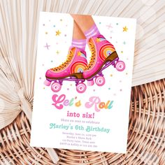 a birthday card with roller skates and stars on the bottom, says let's roll into 6th birthday