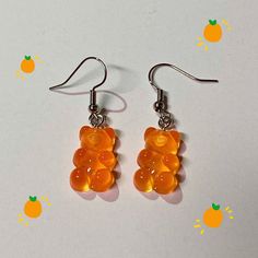 Super cute orange resin gummy bear earrings!! 🧸🧡  Nickel free earring hooks!  Charm size is about 0.7 inch/ 17 mm in length and 0.4 inch/ 10 mm in width Cute Nickel-free Orange Jewelry, Orange Dangle Resin Earrings, Orange Resin Dangle Earrings, Trendy Hypoallergenic Orange Jewelry, Trendy Orange Hypoallergenic Jewelry, Cute Orange Dangle Jewelry, Cute Orange Drop Earrings, Cute Nickel-free Orange Earrings, Cute Orange Nickel-free Earrings