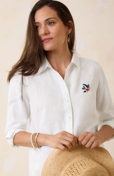 Crisp linen lets you keep your cool on a hot day in this long-sleeve button-up shirt embroidered with colorful tropical flora at the chest and back. Front button closure Spread collar Long sleeves with one-button cuffs 100% linen Machine wash, tumble dry Imported Casual Tops With Floral Embroidery And Spread Collar, Casual Floral Embroidery Tops With Spread Collar, Summer Floral Embroidered Top With Spread Collar, Summer Top With Floral Embroidery And Spread Collar, Summer Embroidered Shirt With Spread Collar, Embroidered Summer Shirt With Spread Collar, Embroidered Linen Long Sleeve Shirt, Embroidered Spread Collar Shirt For Summer, Collared Tops With Floral Embroidery For Vacation