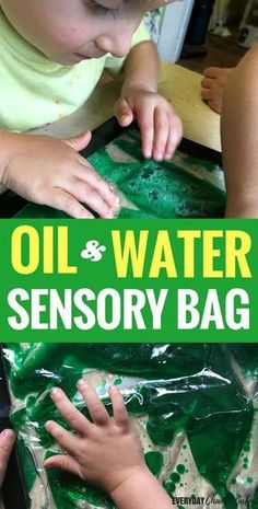 an image of a child playing with oil and water in a bag on the table