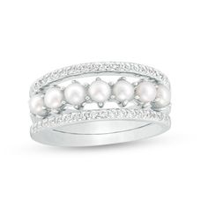 A contemporary style with classic appeal, this pearl and gemstone stackable ring set gleams with fashion possibilities. Crafted in sterling silver, the elegant center ring showcases a row of lustrous 3.0 - 4.0mm oval-shaped cultured freshwater pearls. The two outer bands each sparkle with a row of shimmering white topaz. Wear these rings separately, in pairs or all together. Polished to a bright shine, this ring set offers a variety of modern and sophisticated looks. Custom-made to fit her ring Elegant Pearl Jewelry, Zales Jewelry, Stackable Ring Sets, Buy Pearls, Peoples Jewellers, Stackable Bands, Cultured Pearl Necklace, Gold Jewelry Simple, Ring Ideas