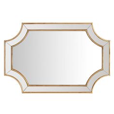 a mirror that is sitting on top of a white surface with gold trimmings