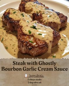 steak with ghostly bourbon garlic cream sauce on a white plate