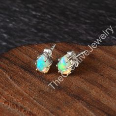 925 Sterling Silver Opal Stud  Earring gift  Item Detail- Product-Earring Color-Multi Color Gemstone-Ethiopian Opal Weight-2.44gram Size-7X9MM Photo Shoot Flash: Yes ABOUT US- WE are manufacture of gemstone jewelry....all jewelry are made through our trained labors we work only natural gemstone.. Customer's Satisfactions is the first priority for us that's why we believe in providing Best Quality Products to Buyers Shipping policy- 1. Ship parcel next day after receiving payment 2. Standards shi Opal Earrings Stud, Opal Studs, Ethiopian Opal, Earings Piercings, Gift Item, Earring Gifts, Gemstone Jewelry, Natural Gemstones, Jewelry Earrings Dangle