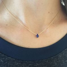 "This genuine teardrop sapphire sits on a simple, dainty cable chain. This minimalist necklace is perfect as an everyday necklace and it's also a great piece for layering necklaces. Blue sapphire is the September birthstone. Because of the simplicity and birthstone quality, this simple, dainty necklace makes the perfect gift.  Model is wearing a 16\" sapphire teardrop necklace in gold filled, September's birthstone. CRAFTSMANSHIP  Jewelry is handmade by us in our NYC studio. We focus on craftsmanship and quality using only the highest quality materials and handpicked genuine gemstones.  PACKAGING We take pride in creating beautifully packaged orders. Jewelry arrives delicately wrapped in tissue and placed in a kraft box inside a logo drawstring pouch. Your package will arrive nice enough t Sapphire Necklace Gold, September Birthstone Necklace, Blue Sapphire Jewelry, Sideways Initial Necklace, Blue Sapphire Necklace, Necklace Minimalist, Teardrop Necklace, September Birthstone, Sapphire Necklace