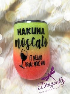 a hand painted wine glass that says hakuna moscata it means drunk more wine