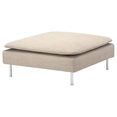 a beige ottoman with metal legs on an isolated white background