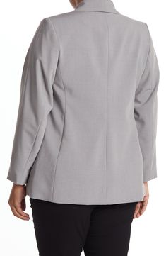 Elevate your professional wardrobe with this flattering shawl collar blazer featuring an open front and optional roll-up cuffs for trendy style. 32" length (size 14W) Shawl collar Long sleeves Open front Chest welt pocket Front welt pockets Woven construction Lined Shell: 65% polyester, 31% rayon, 4% spandex/Lining: 100% polyester Dry clean Imported Model’s stats for sizing: 5’9” height, 40” bust, 35” waist, 48” hips. Model is wearing size 14W. Calvin Klein Long Sleeve Career Blazer, Spring Office Blazer By Calvin Klein, Calvin Klein Spring Office Blazer, Calvin Klein Notch Lapel Blazer For Work, Calvin Klein Notch Lapel Business Casual Blazer, Calvin Klein Long Sleeve Business Blazer, Calvin Klein Long Sleeve Business Casual Blazer, Calvin Klein Blazer For Business Casual In Fall, Classic Calvin Klein Blazer For Work