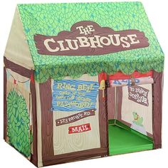 a cardboard toy house with the door open