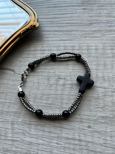 Black Agate Stone and Seed Bead Bracelet🖤  These small, simple bracelets are perfect for everyday wear. ✨ - Different sizes available. Please message me if you need a size that is not posted.   JEWELRY CARE: Avoid direct contact with lotions, perfumes and soap or other chemicals that could cause discoloration.  💜TIPS: Remove before showering, swimming, or other water activities. ⚠️ WARNING: Bracelets are made with small beads that could be a choking hazard.  - Do not leave children unattended with jewelry. - Excessive stretching can lead to breaking/ tearing the bracelets Faith Seed, Seed Bead Bracelets Tutorials, Black Agate Stone, Stone Cross, Christian Bracelets, Men Bracelets, Stone Bracelets, Beaded Bracelets Tutorial, Seed Bead Bracelet