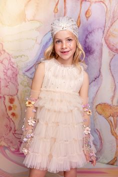 Sprinkle a little magic with the Tiny Dancer Turban in Mother of Pearl. This classic piece is made of layers of our sumptuous signature fine tulle gathered in the center, and adorned with a dusting of hand applied sequins. There are strictly no refunds on sale items unless faulty or wrongly described. There are no re-stocks on sale Shipping and Returns There are strictly no refunds on sale items unless faulty or wrongly described. There are no re-stocks on sale. All orders are dispatched from ou Festive Princess Tutu Dress In Tulle, Festive Princess Style Tutu Dress, Spring Festive Tulle Tutu Dress, Pink Elegant Tutu Dress For Festive Occasions, Elegant Pink Tutu Dress For Festive Occasions, Elegant Pink Festive Tutu Dress, Festive Tulle Tutu Dress With Ruffles, Festive Ruffled Tulle Tutu Dress, Festive Fitted Tulle Tutu Dress