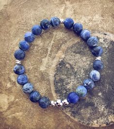 The pacific blue beachy bracelet style pack can be worn either as a set of three bracelets, each bracelet individually, or any combination of the three ... it's your choice! Designed & coordinated to be worn together - as many or as few as you'd like!⠀ pacific blue consists of ... ~ a blue stone gemstone and navy leather strap bracelet with chain extender~ a blue beaded & silver plated bar bracelet with adjustable microfiber cord slider strap~ a matte blue sodalite and silver plated mala Ocean-inspired Blue Beaded Bracelets For Beach, Turquoise Ocean-inspired Beaded Bracelets For Beach, Adjustable Ocean-colored Bracelets For The Beach, Bohemian Blue Shell Bracelet, Adjustable Ocean-inspired Turquoise Beaded Bracelets, Beachy Bracelets, Beach Wrap, Blue Sodalite, Pacific Blue