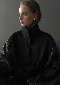 A classic style reimagined, the Black Cocoon Wool Coat is a timeless wrap coat crafted from a versatile wool and cashmere blend. Tailored in a cocoon shape, this wardrobe icon is complete with voluminous pleated sleeves and optional belt fastening and can be worn over layers to effortlessly complete a look.Composition 100% Italian woolSleeves & Belt: 65% polyester, 35% polyurethane (deadstock)Lining: 60% polyester, 40% cottonModel is 180 cm tall and wears M sizeDry clean only.Warm iron inside ou Creative Design Studio, Pleated Sleeves, Fall Layers, Wrap Coat, Women Artisans, Black Coat, Wool Coat, Black Satin, The Black