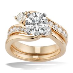 a gold engagement ring set with two diamonds