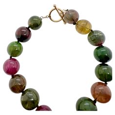 For Sale on 1stDibs - This amazing strand of multi-color tourmaline beads will amazing with any outfit. The rich, vibrant colors of maroon red, green, purple, and yellow tourmaline Purple And Yellow, Tourmaline Beads, Maroon Red, Red Green, Tourmaline, Jewelry Box, Multi Color, Beaded Necklace, Vibrant Colors