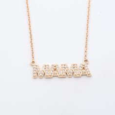 Treat yourself to a sparkly surprise! With Diamond MAMA Necklace you can show off your maternal pride with a dazzling diamond pendant draped around your neck. This timeless piece is sure to be a show stopper! 14k Yellow Gold | 14k White Gold | 14k Rose Gold | Sterling Silver Pendant: 20 x 6 mm 1/10 CTW l1 clarity natural diamond Adjustable 16" | 18" chain Mother's Day Yellow Gold Diamond Necklace, Mother's Day 14k Gold Jewelry With Diamond Accents, 14k Gold Jewelry With Diamond Accents For Mother's Day, White Gold Diamond Necklace Gift For Mom, Mother's Day Rose Gold Jewelry With Diamond Accents, Diamond Pendant Necklace For Mother's Day, Mother's Day Dainty Diamond Accent Necklaces, Mother's Day Dainty Necklace With Diamond Accents, Elegant Diamond Jewelry As Gift For Mom