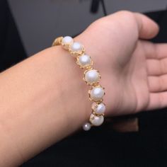 This beautiful Freshwater pearl bracelet ranges between 8-9mm in size and consists of beautiful and lustrous pearls in AAAA+ quality. All pearls in this bracelet are round and are strung with silk thread and double-knotted between each pearl. Known as the 'icon' of cultured pearls, Freshwater pearls have graced the necks, ears, fingers, and wrists of women for decades. Huge Tomato imports their Freshwater pearls from the Freshwater rs of Japan, grown in the Pinctada fucata oyster. All of our Fre Pearl Bangle Bracelet With Pearl Chain, Pearl Chain Bangle Bracelets, Elegant Pearl White Beaded Bracelets With 8mm Beads, Adjustable Pearl Bracelet With Pearl Pendant, Pearl Chain Bracelet As Gift, Adjustable Bracelet With Pearl Pendant, Pearl White Akoya Pearl Bracelet As Gift, Pearl Bracelets With Pearl Drop, Adjustable Pearl Bracelets With Pearl Pendant